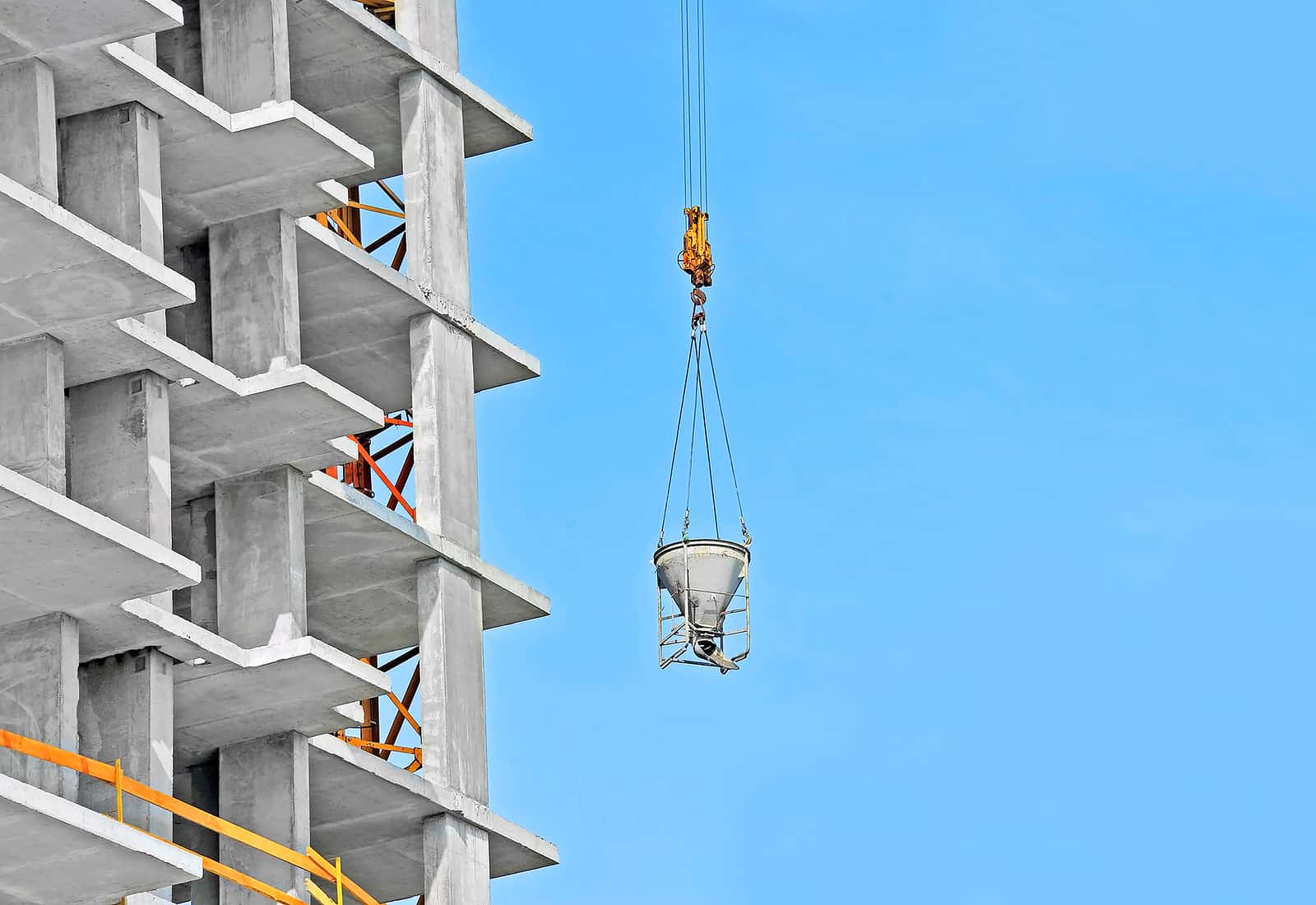 Crane Lifting Cement Mixing Container | SJ Construction Consulting, LLC